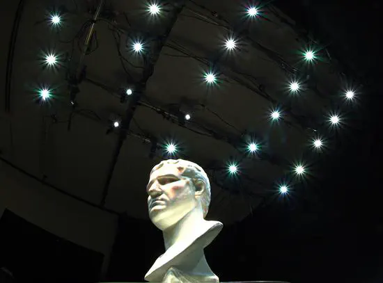 Shadowless Projection Mapping for Tabletop Workspaces with Synthetic Aperture Projector